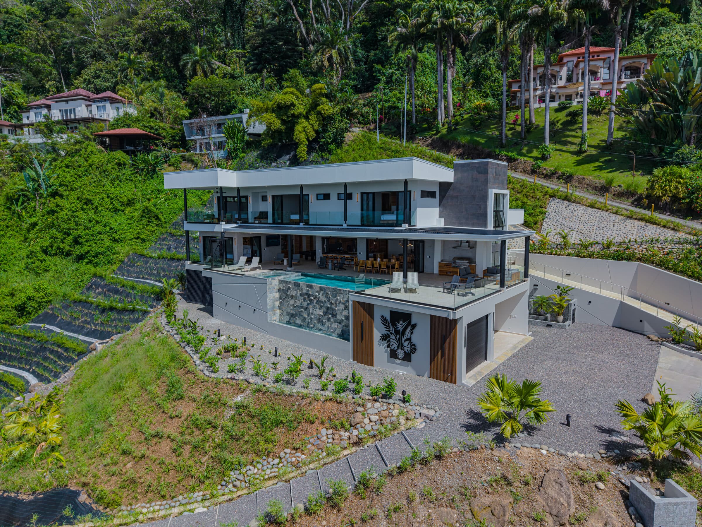 Casa Paraiso full facade with pool and landscaping