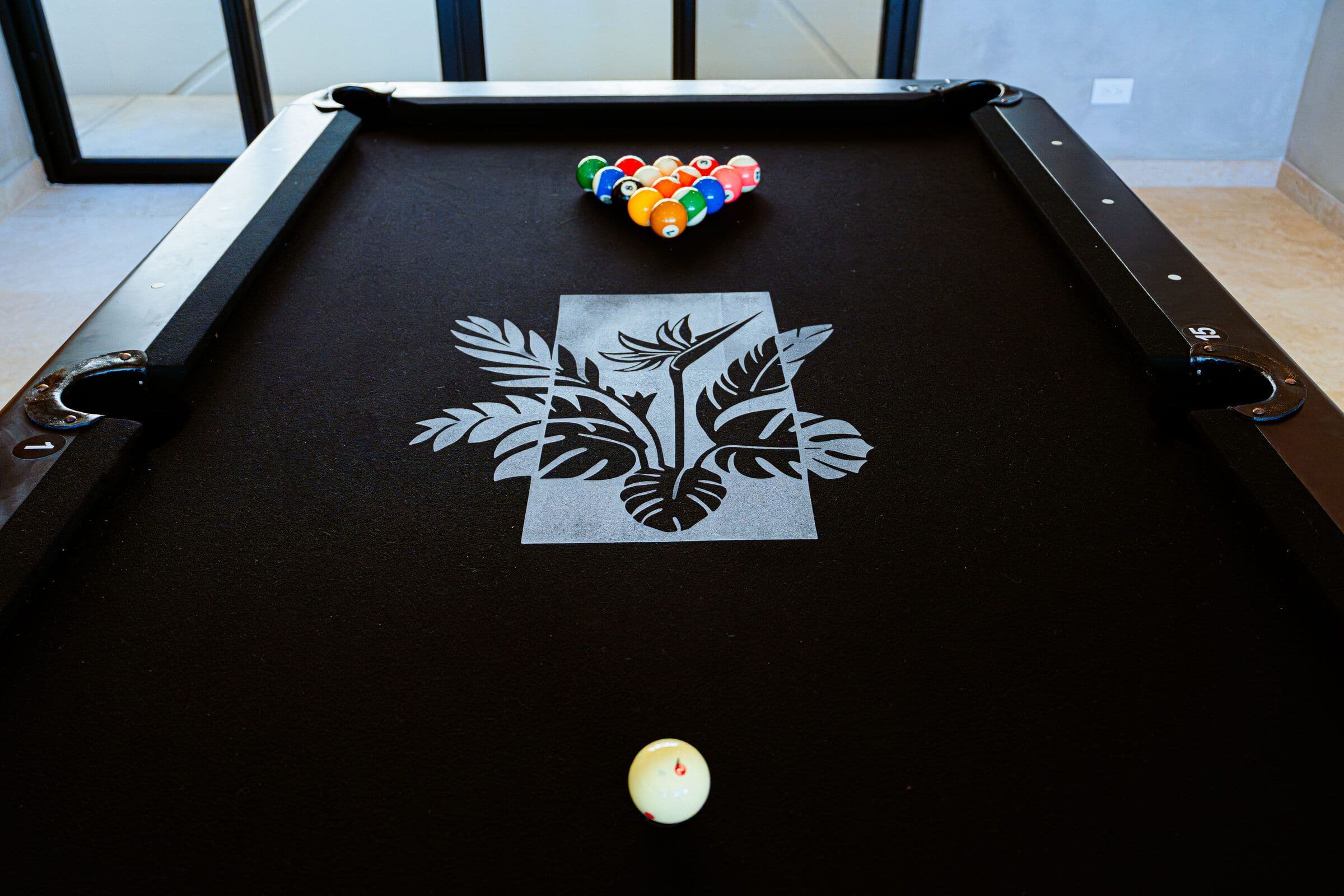 Pool table, bar, and lounge area