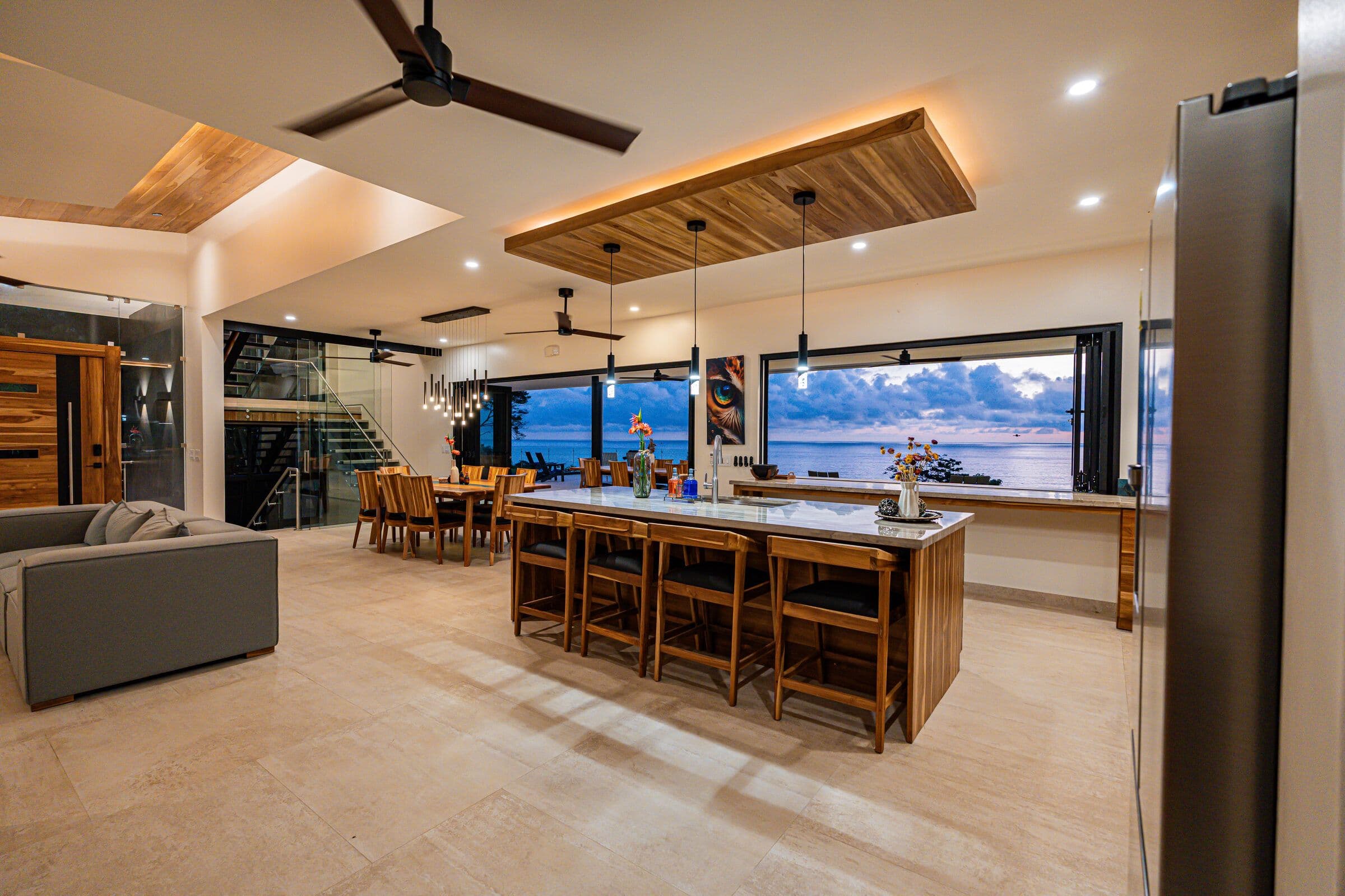 Kitchen island at blue hour with ocean view